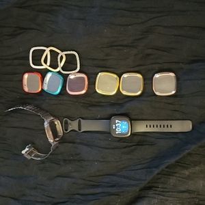 Fitbit Versa 3 with accessories